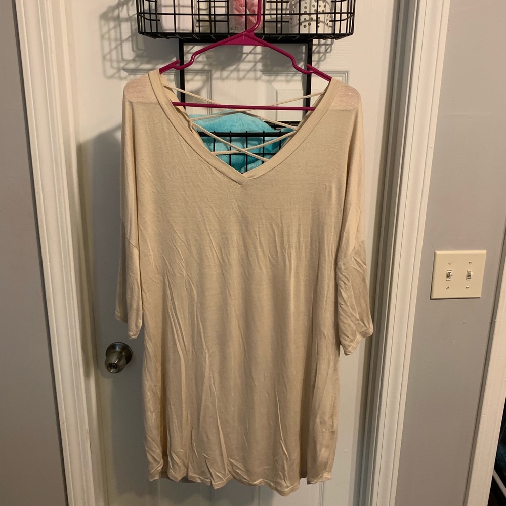 cream colored flowy top